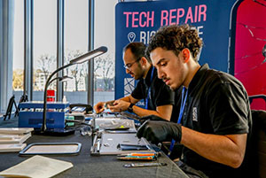 Disabled man working at Repair Centre thanks to UnLtd and City & Guilds Group