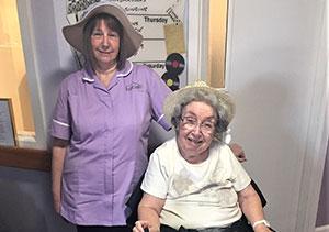 Two Care home residents singing for Parkinson’s sufferers