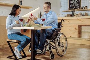 People with disabilities on a date after using dating websites