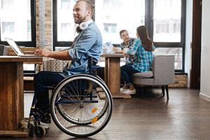 Man working in a job with a disability